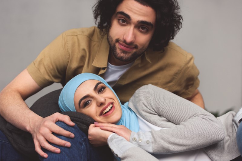 modern muslim couple is close