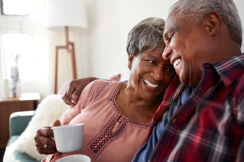 senior couple laughing together at home