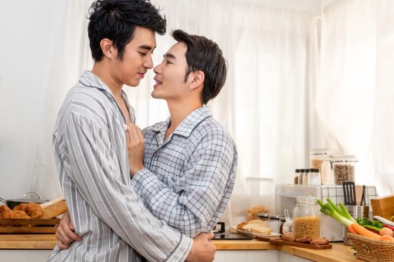 asian male couple in pajamas